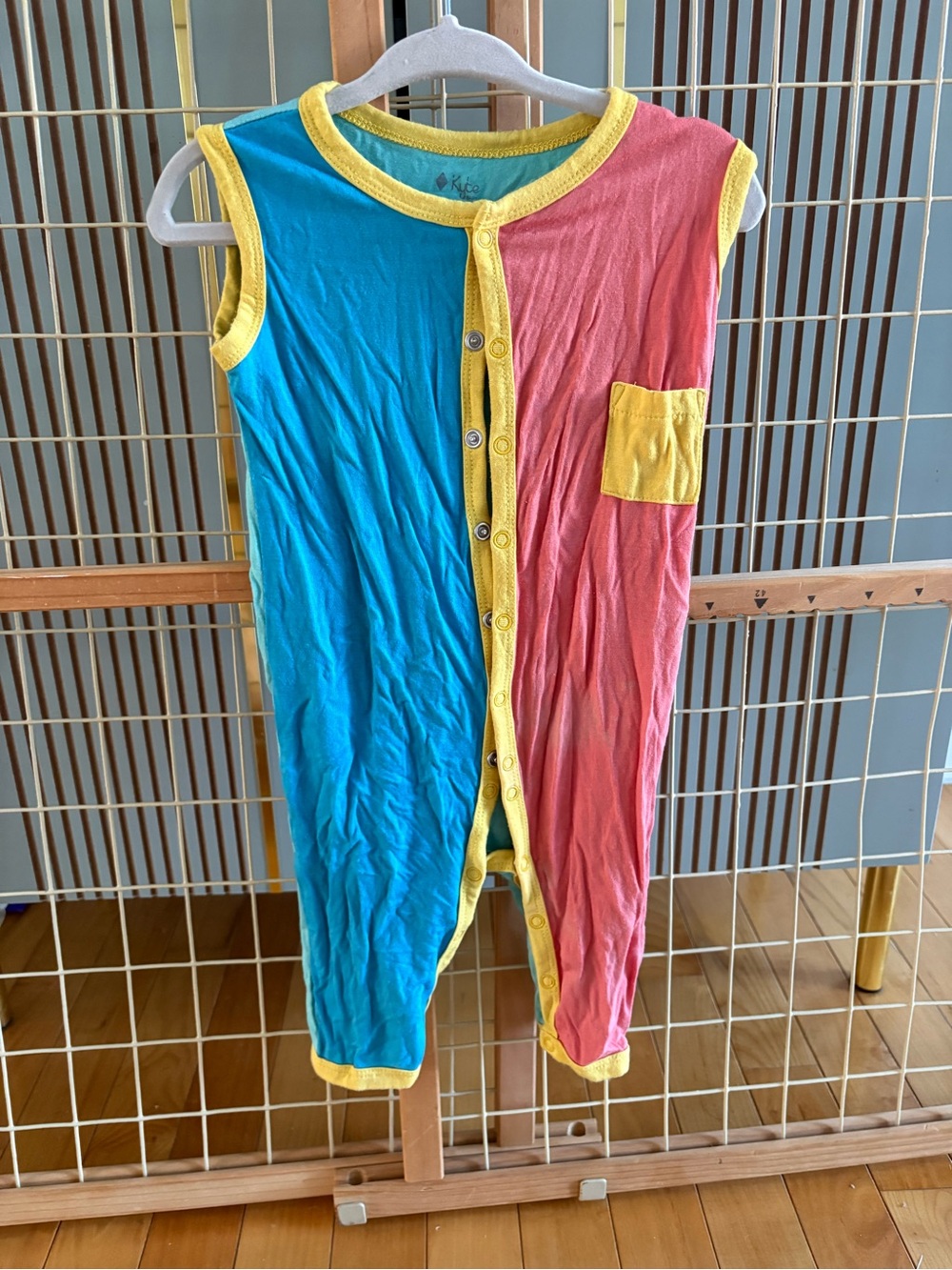 Kyte BABY Colorblock Sleeveless Pajama Romper in Blue, Pink & Yellow Trim